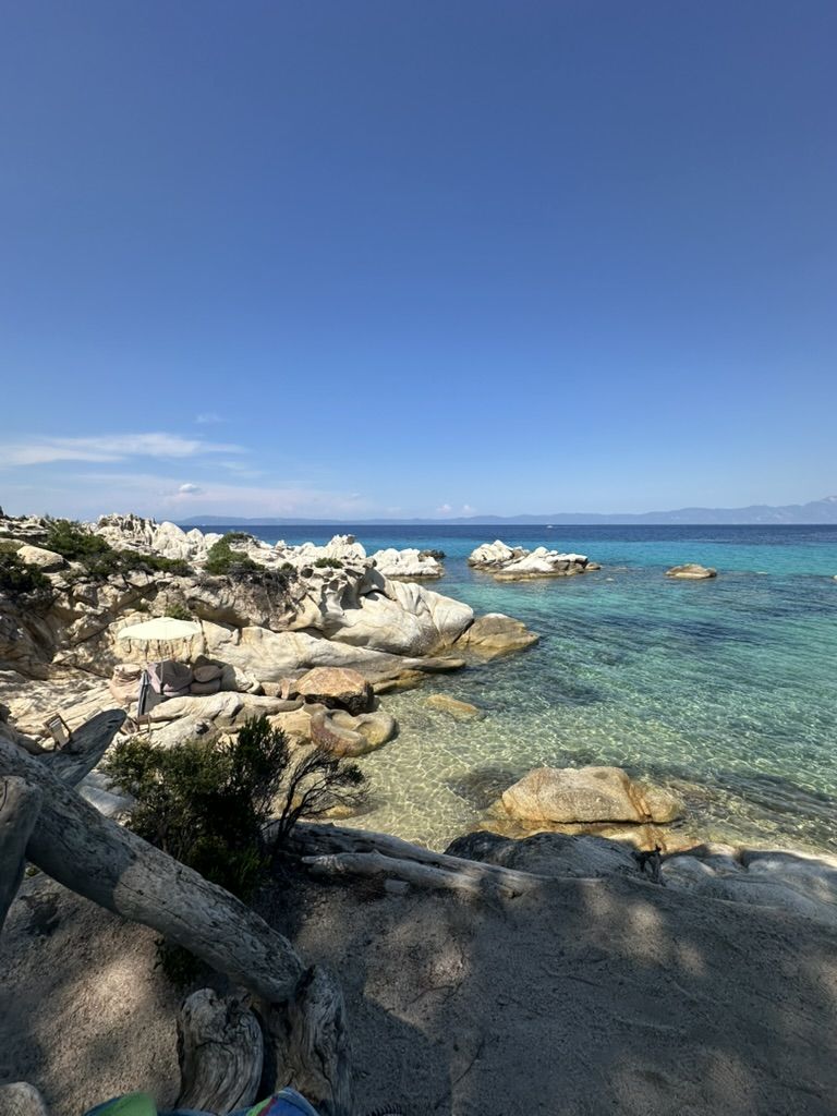 White granite rocks and clear turquoise water at Paradise beach, Kavourotrypes