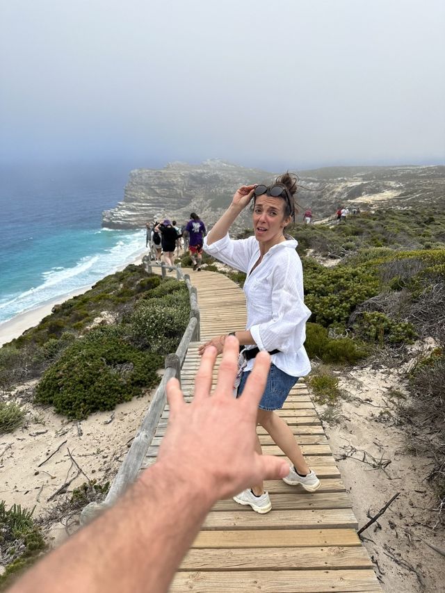 Anastasia on a windy cliff boardwalk