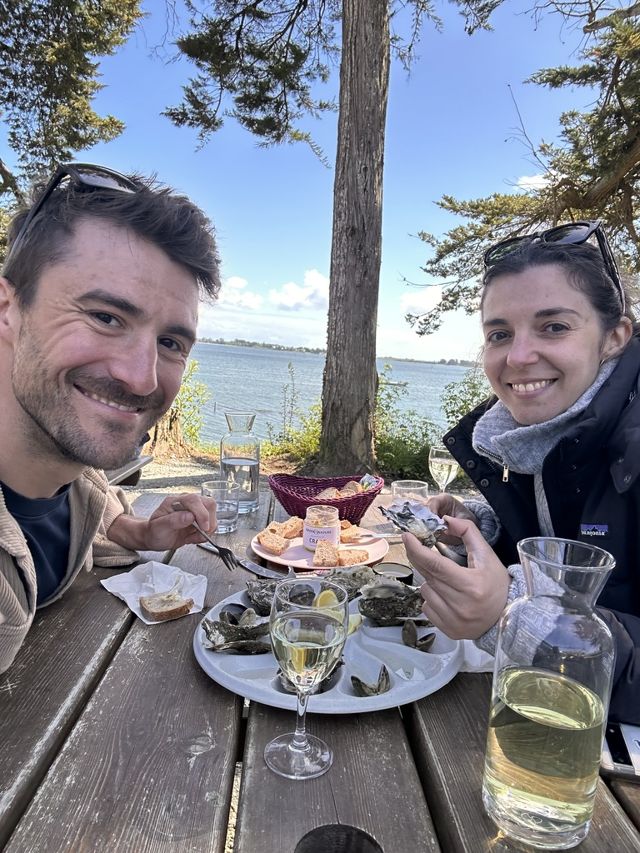 Oysters and white wine by the water